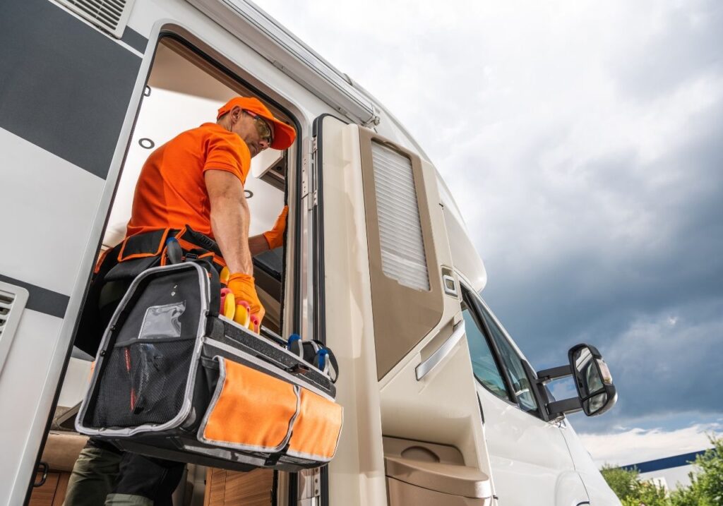 RV technician checking the rv door