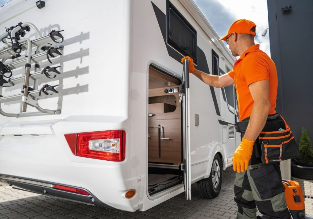RV technician checking the rv door