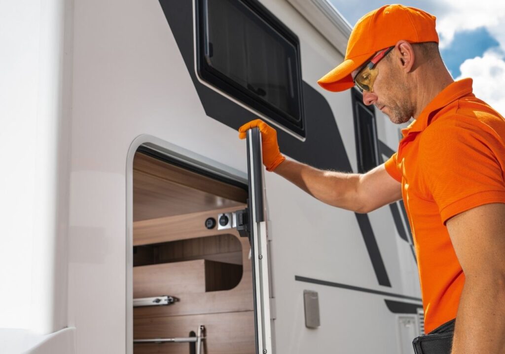 RV technician checking the rv window