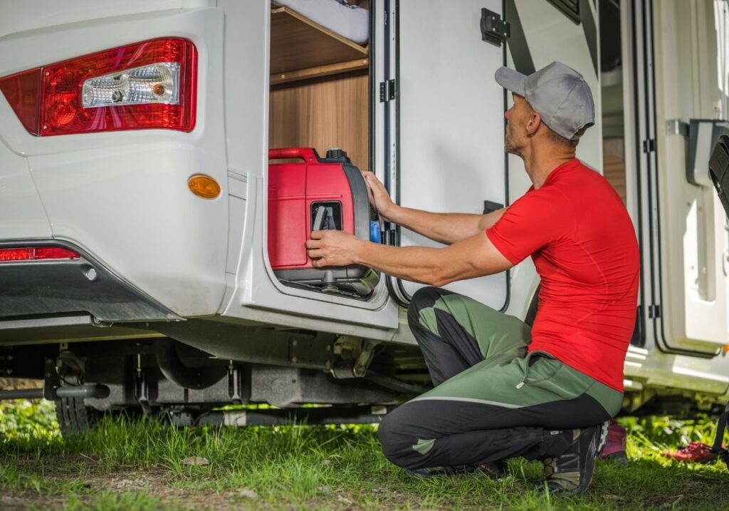 RV technician fixing an RV Generator