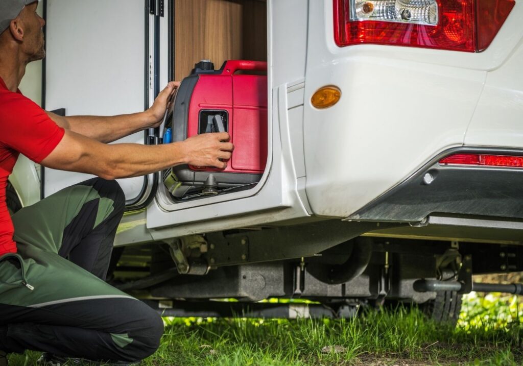 RV technician fixing an RV Generator