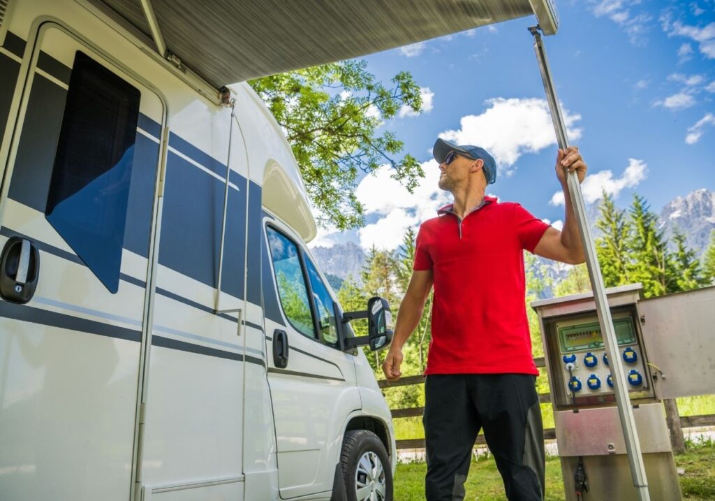 RV technician checking the rv awning