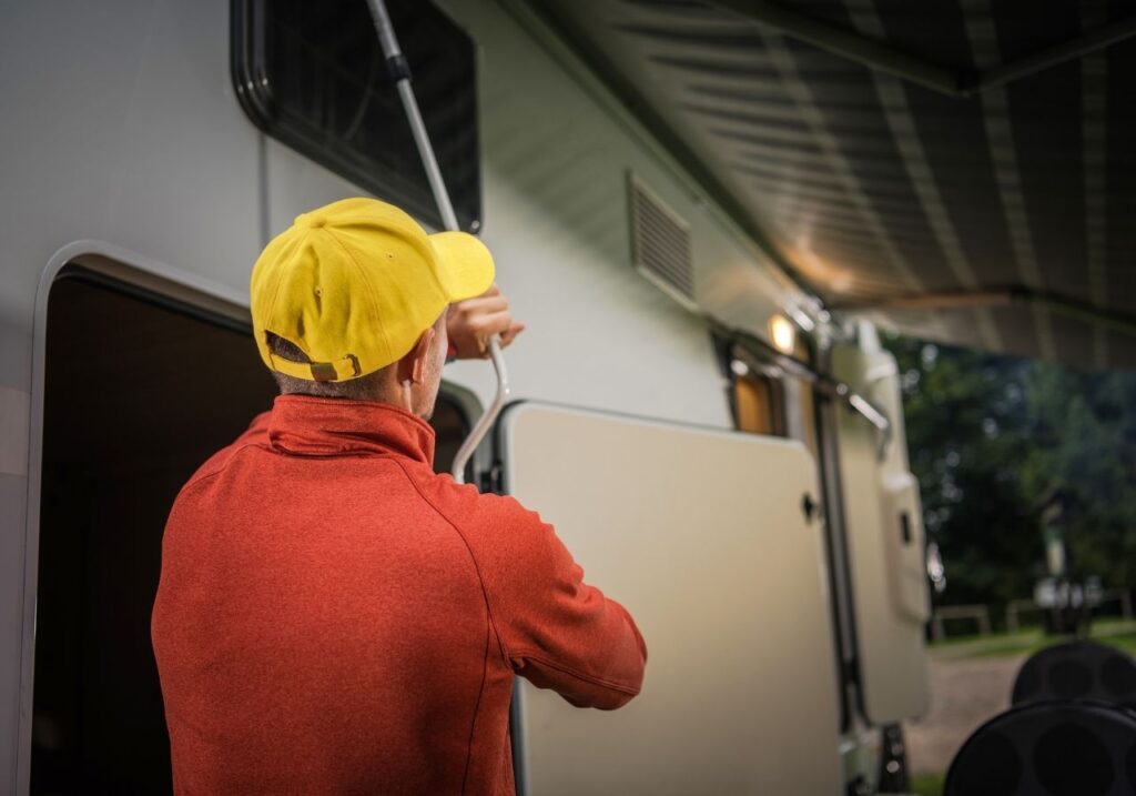 RV technician checking the rv awning